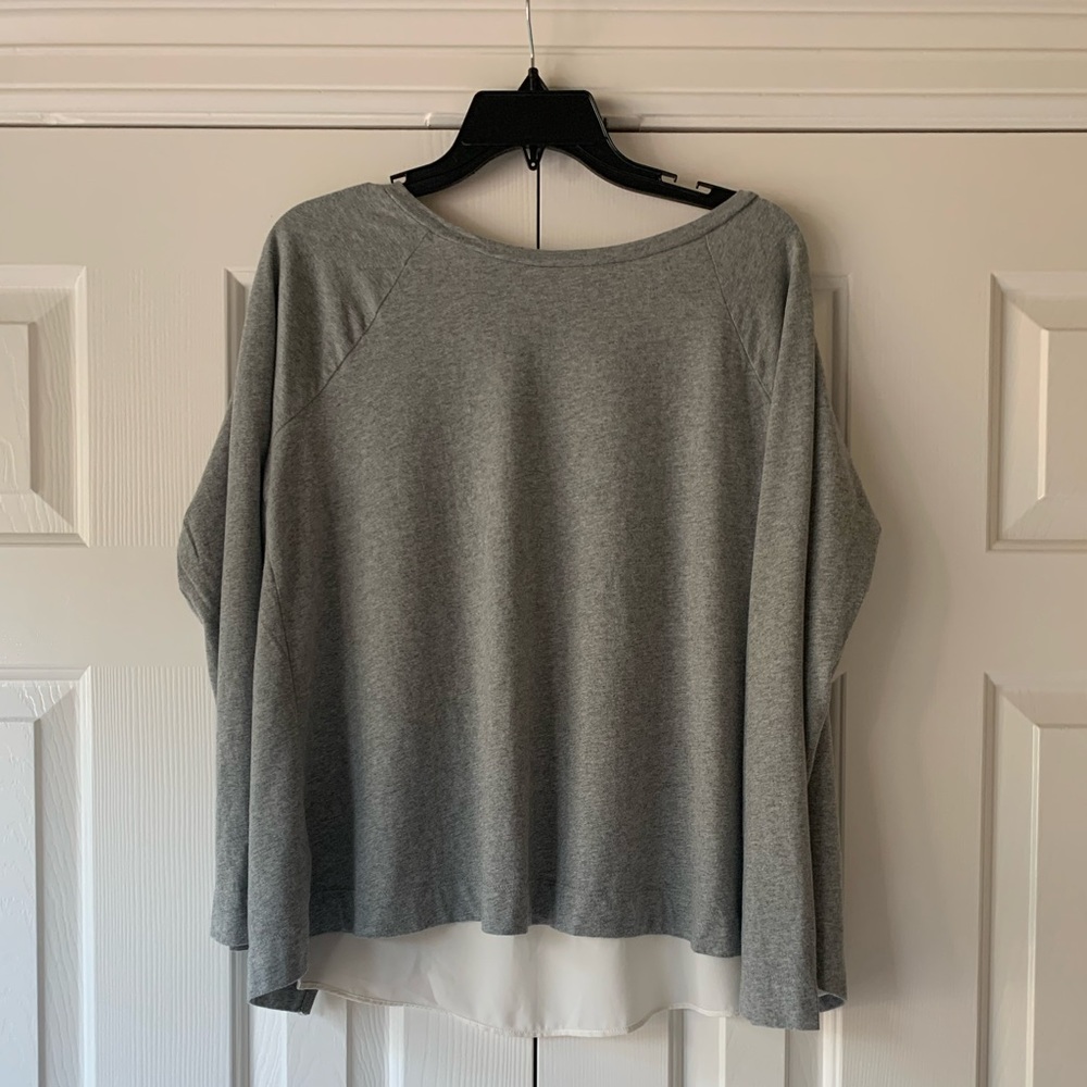 Loft, soft, gray, long sleeve, with cream insert in back, excellent condition.